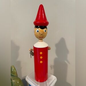Pinnochio Handpainted wood bank with lock and key. 12” high. Vintage.